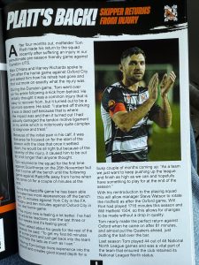 A picture of a Darlington programme showcasing Max and Harvey’s work.